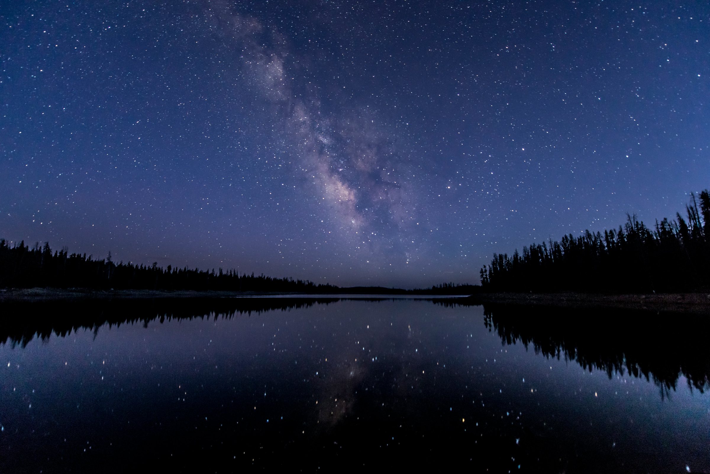 The Milky Way over a lake at night
